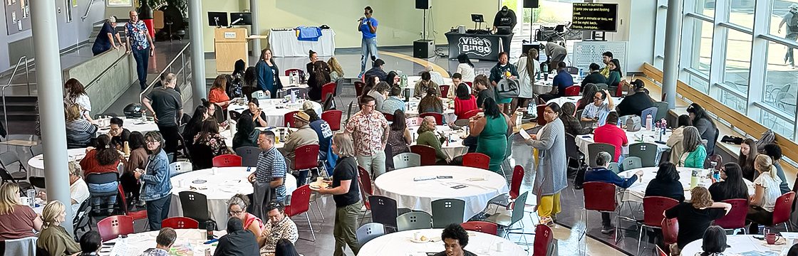 Highline College Opening Week Resource Fair with faculty talking with students